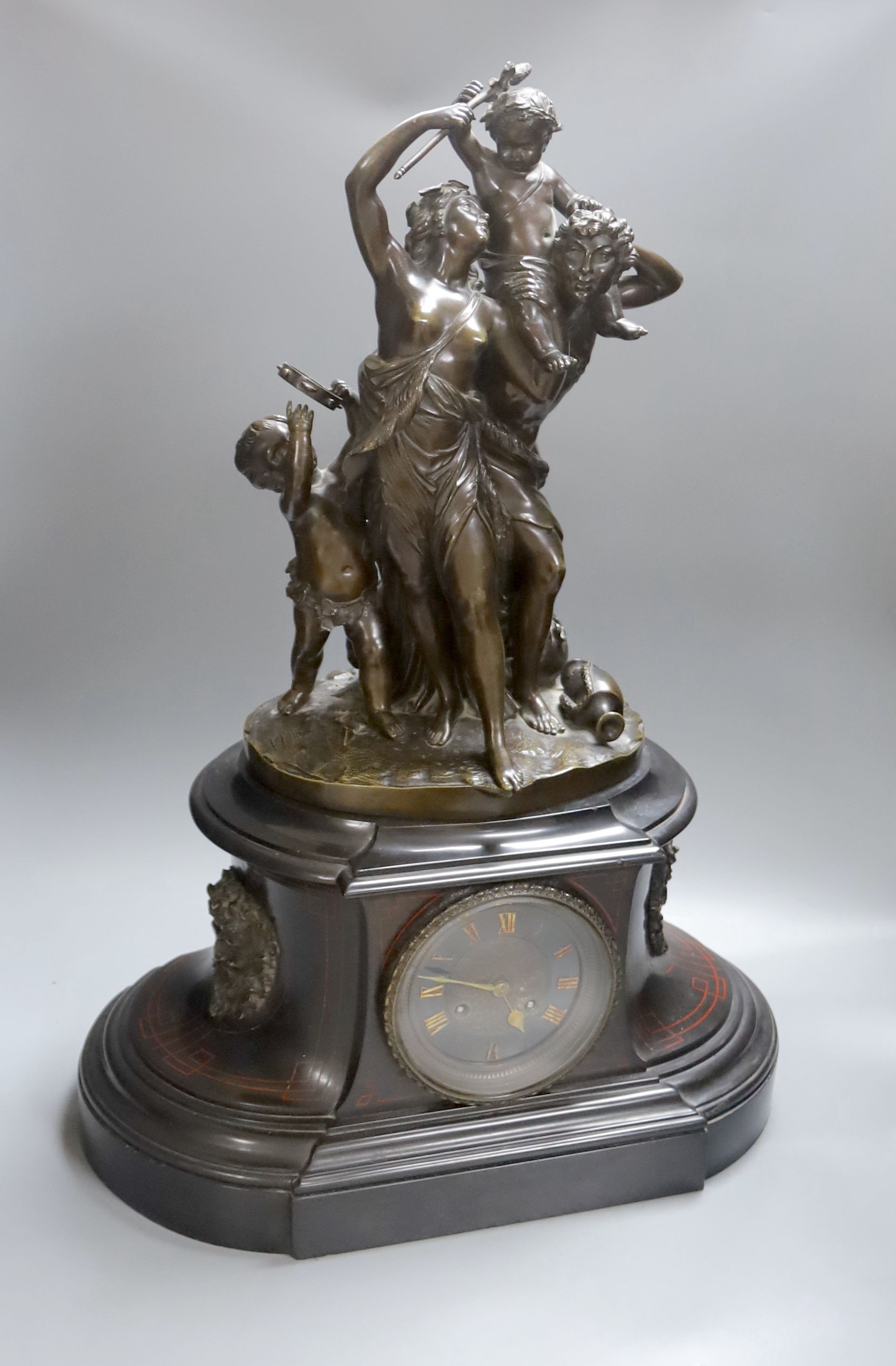 A large 19th century bronze and marble figural mantle clock, Gautier editeur foundry mark 64cm. Key and pendulum